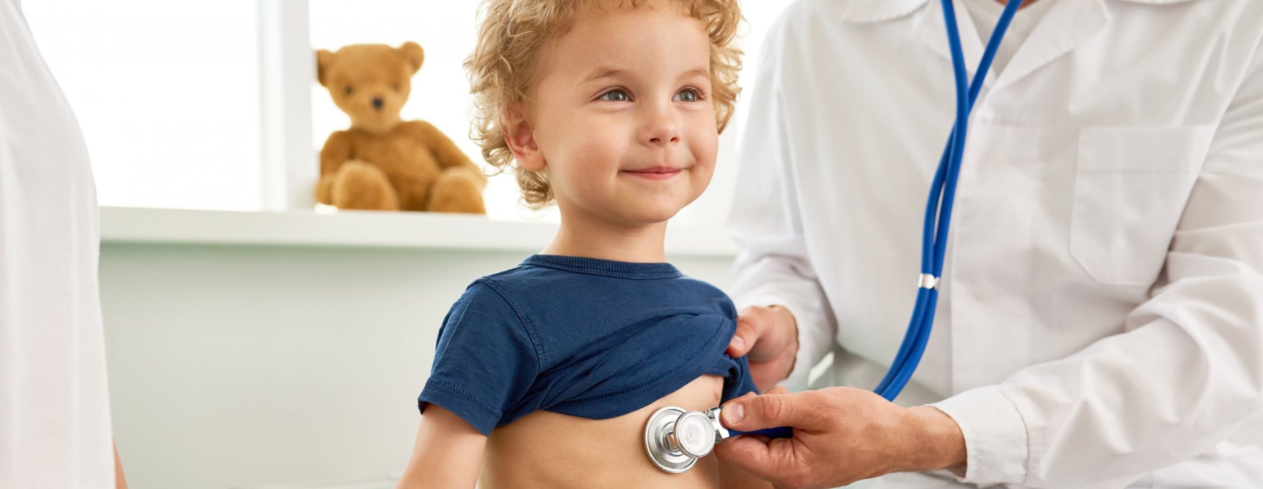 Child being examined by paediatrician